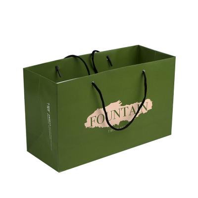 China Luxury Recyclable Gold Foil Gift Handles Sale Bag No Glue Wedding Paper Bags Printed Logo Delivery aAdvertising for sale