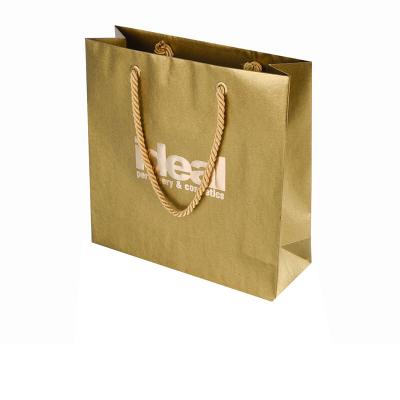 China Recyclable Label Logo Printable Branded Clothes Paper Bag Making Gold Foil Printing Perfume Paper Bag Shopping Packaging for sale