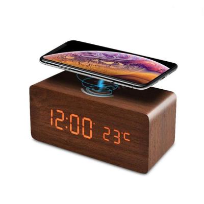 China Creative Antique Style Mobile Phone Wooden Clock LEDElectronic Wireless Charging Digital Time-temperature Alarm Clock for sale