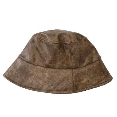 China 100% Polyester Vintage PU Faux Leather Animal Pattern Fisherman Hat Bucket Sun Hat for sale