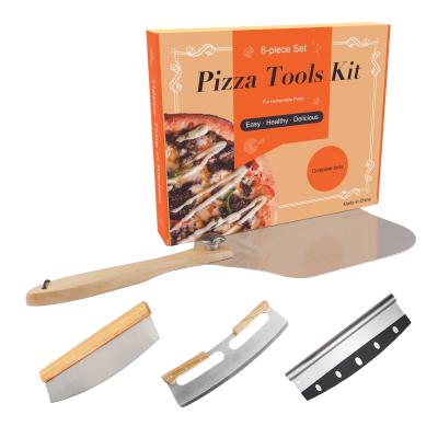 China Best Stocked Selling Aluminum Wooden Folding Handle Pizza Peel Stainless Steel Rocker Style Pizza Cutter Pizza Tool Kit for sale