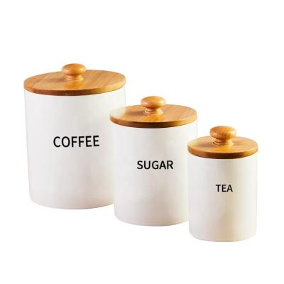 China Viable Custom Made Porcelain Coffee Tea Container Ceramic Food Storage Jar With Airtight Seal Bamboo Lid for sale