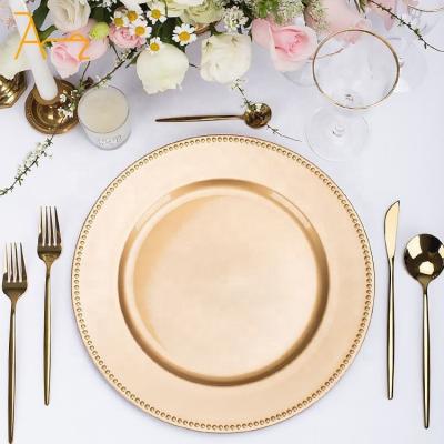 China Sustainable 2023 New design plastic rose gold silver white charger plates wedding party decoration clear beaded acrylic charger plates for sale