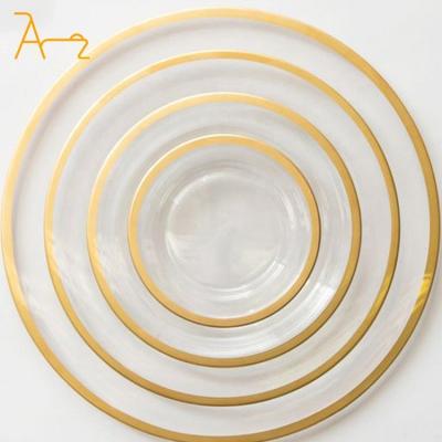 China Sustainable Wholesale wedding decoration round clear dinner plates restaurant dinnerware black rim cheap glass charger plates for sale