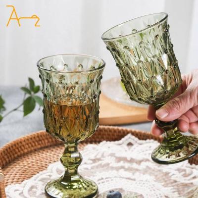 China Sustainable Various Logo And Color Available Retro Drinking Goblet Glassware Custom Colored Vintage Embossed Wedding Decoration Wine Glasses for sale