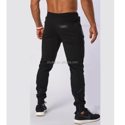 China Professional custom men's anti-pilling solid color slim fit sports tracksuit joggers pants black joggers for sale