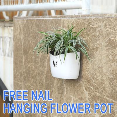 China Free Multi Colors Hot Self Selling Self Nail Garden Planter Flower Pot Watering Decorative Wall Mounted Plastic Hanging Flower Pot for sale