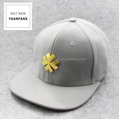 China COMMON Custom Design Gold Metal Plate Logo Snapback Hats And Caps for sale