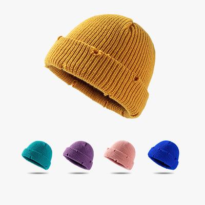 China Fashion New COMMON Loot Hollow Out Designer Cuffed Skull Cap Winter Knitted Beanie Hats For Women Mens for sale