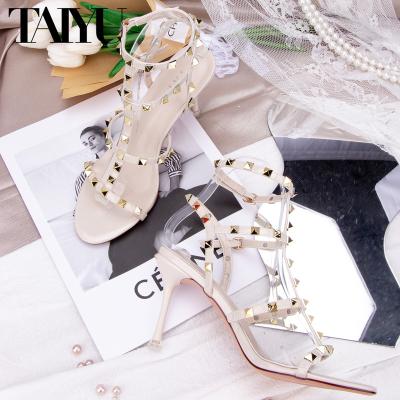 China Hot Selling Fashion Trend High Heel Sandals Ladies Heel Sandals And Slippers Rivet Elegant Sandals For Women for sale