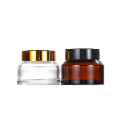 China Personal Care Wholesale Frosted Clear Round Glass Cosmetic Cream Jar With Matte Silver Cap for sale