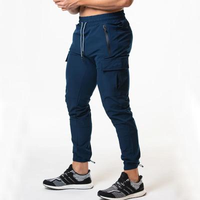 China Anti-Wrinkle USA Sizing SS211129 Men Slim Fit Pocket Custom Cargo Joggers Plain Waterproof Cargo Joggers Pants for sale