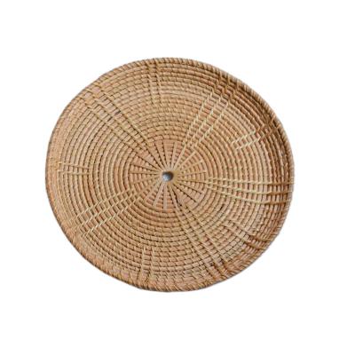 China Sustainable Hot Selling Rattan Hand & Woven Fruit Storage Coasters Around Serving Wicker Tray For Multipurpose Home Decoration for sale