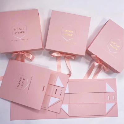 China Custom Recycled Rigid Wedding Birthday Clothing Materials Logo Pink Foldable Gift Box Packaging With Magnetic Lid for sale