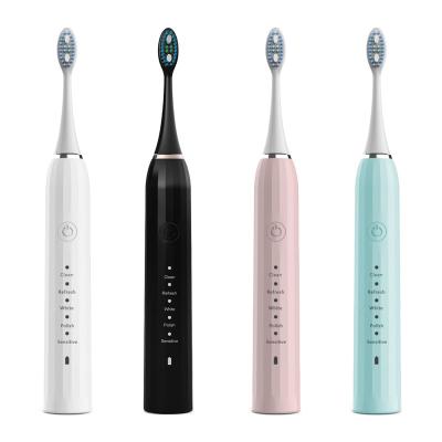 China Food grade ABS+PC Amazon hot selling smart sonic electric toothbrush IPX7 waterproof portable rechargeable toothbrush with 2 soft bristles for sale