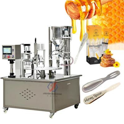 China High Efficient Hot Sales Plastic Cup Honey Spoon Filling Machine Water Honey Spoon Filling Machine for sale