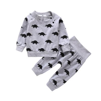 China 0-3T Kids Baby Boy Girl Clothes Breathable Newborn Dinosaur Print Outfits Set Sweatshirt Tops And Pants Infant Clothes Sets for sale