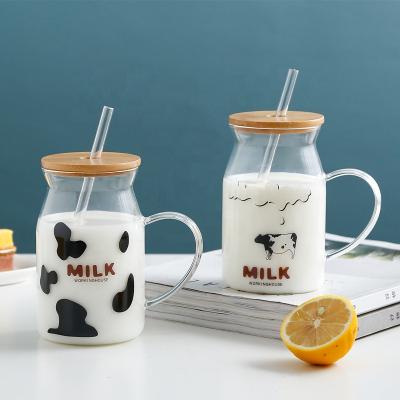 China Creative Sustainable Glass Milk Bottle Cartoon High Borosilicate Glass With Handle And Straw Gift Cup for sale