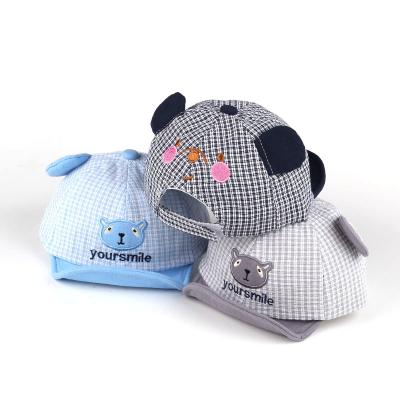 China Character Stocking Sale Guangzhou Fashion Baby Small Cap Fancy Plaid Embroidered Baby Bear Hat for sale