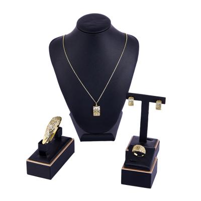 China 2021Hot Environmental Friendly Selling New Simple Fashion Full Gold Plated Elegant Drill Hollow Out Bracelet Ring Jewelry Set Necklace Earrings Set for sale