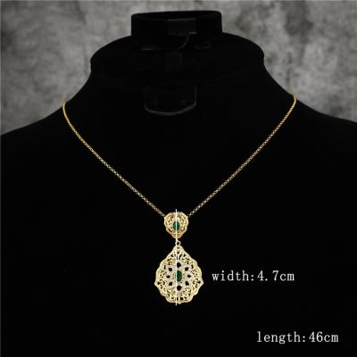 China 2021Simple Hollow Wedding 14k Gold Color Environmental Friendly Kaftan Pendant For Women Fashion Green Stone Jewelry Copper High Quality Pendant for sale