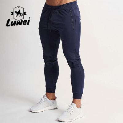 China Fashion Tapered Sweatpants Long Slim Fit Cotton Elasticity Gym Sweatpants Mens Joggers Pants Sporty Pants QUICK DRY for sale