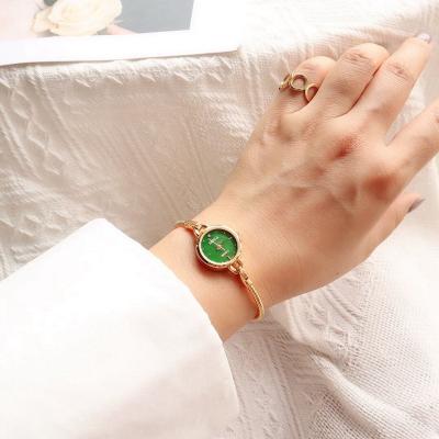 China Small And Delicate Gold Quartz Watch Lady Women Ladies Round Green Watch Aimgal Strap Type Water Resistant Retro Small for sale