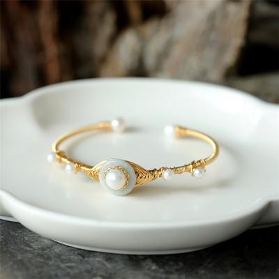 China FASHIONABLE Gold Round Natural Round Package Bracelet 14K Pearl Freshwater Jade Pearl Bracelet Creative New Accessories for sale