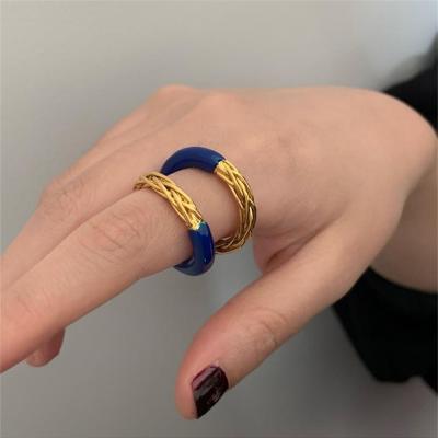 China Aimgal TRENDY Jewelry Copper Plated 18K Gold Twist Metal Contrast Color Shape Open Ring For Women for sale