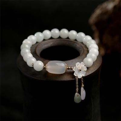 China Aimgal FASHIONABLE Original Handmade Light Luxury Natural Jade Bracelet 14K Gold Filled Women's Bracelet Shell Flower Natural Jade Bangle for sale