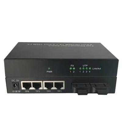 China FTTH 10/100M 4 SC RJ45 2 Ports Fiber Ethernet Switch 20km Fiber Optic Fiber Converter for sale