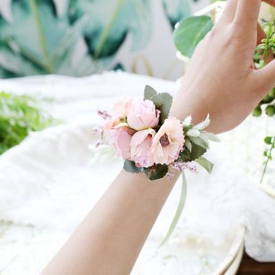 China Retro Eco-friendly European Bride Rose Groom Wedding Accessories Wrist Flower Corsage Artificial Flowers for sale