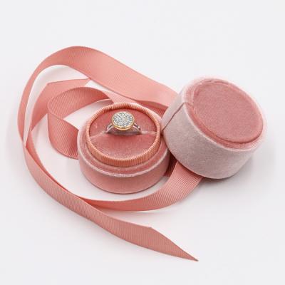 China Jewelry Display and Packaging Cute Velvet Jewelry Ring Boxes Gift Box Luxury Round Velvet Jewelry Box with Ribbon for sale