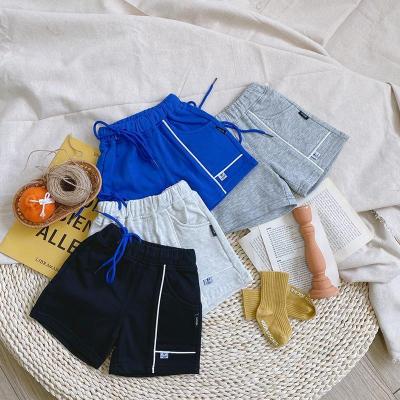 China Anti-wrinkle 2021 New Summer Kids Clothing Children Clothes Casual Baby Pants Cotton Candy Color Boys Girls Casual Shorts for sale