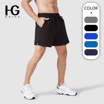 China QUICK DRY Men Running Shorts Athletics Training Beach Quick Dry Shorts For Men's Leisure To Loosen Summer Running Men's Fitness Shorts for sale