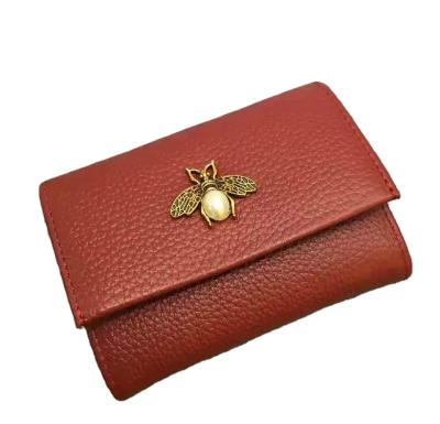 China 2021 New High Quality Ladies Wallet Fashion Leather Double Bee Lock Top Layer Whip Single Clutch for sale