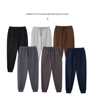 China Anti-wrinkle fall/winter combed cotton sports simple casual pants keep pants Korean style solid color men's fashionable pants for sale