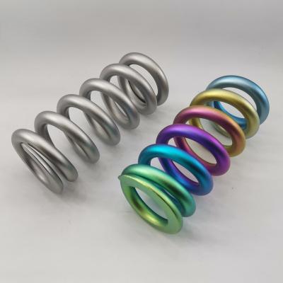 China Rainbow colored titanium coil factory GR5 vr38dett engine alloy performance exhaust valve spring for sale