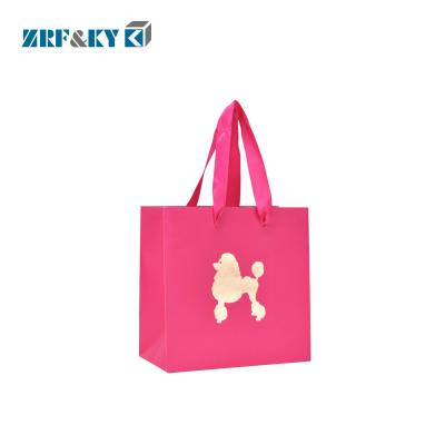 China Recyclable Custom Printed Fashion Cardboard Paper Shopping Bags with Ribbon Handles for sale