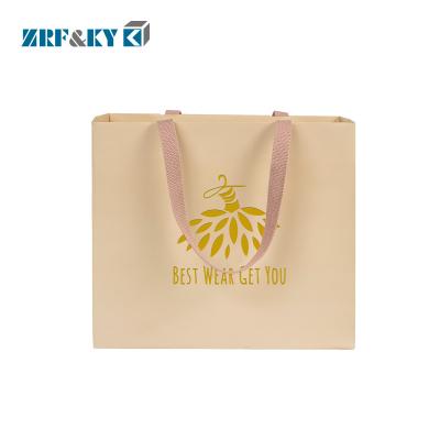 China Recyclable Custom Machine-Made Flat Paper Handle Brown Kraft Paper Shopping Bag for sale