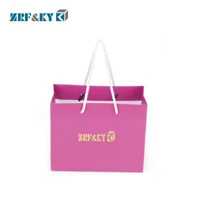 China Recyclable Custom Full Printing Pink Color Printed Hot Foil Stamping Logo Paper Shopping Gift Bags for sale