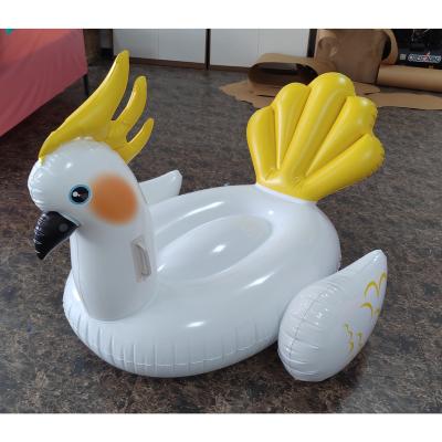 China Custom Water Entertainment Giant Parrot Inflatable Floating Pool Ride-On Pool Float For Adults for sale