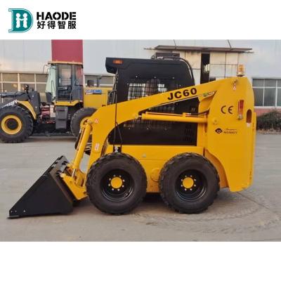 China Building Material Shops HAODE Attachments Optional 500kg 700kg 850kg 950kg 1050kg Skidsteer Skidsteer Wheel Skid Steer Loaders For Sale for sale