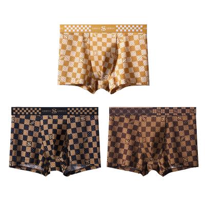 China 2023 Luxury High Elasticity Antibacterial Ice Silk Breathable Skin Friendly Checkerboard Mesh Underwear Men Boxers for sale