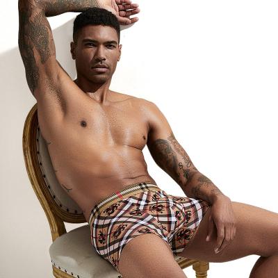 China 2023 Factory Wholesale Antibacterial Vintage Cotton Skin Friendly Underwear High Elasticity Briefs And Boxers Printing Men for sale