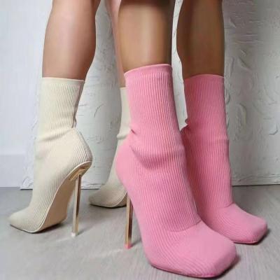 China Fashion trend ready to boat winter boutique candy color fashion high heel women boots fly to knit shoes for sale