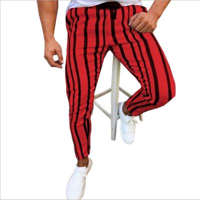 China 2021 QUICK DRY New Trend Striped Slacks Stretch Small Slim Foot Cone Pants Mens Sports Pants Sweatpants Man for sale