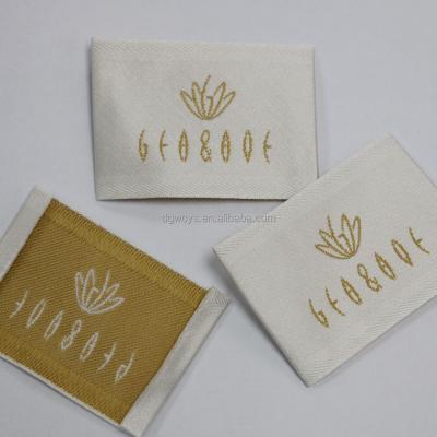 China Sustainable hot sale custom woven cheap handmade clothing labels for garment. cheap price woven head label for women clothes for sale