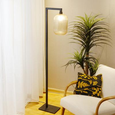 China Modern Amber Glass Floor Lamp Standing Lamp With Glass Shade for sale