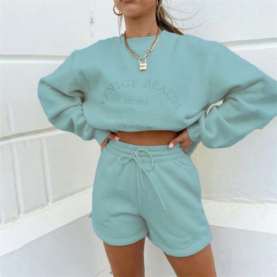 China Breathable Noise Cycling Street Pullover O Neck Long Sleeve Letter Embroidery Quantity Top Short Sweater For Women Pants Two Piece Set for sale